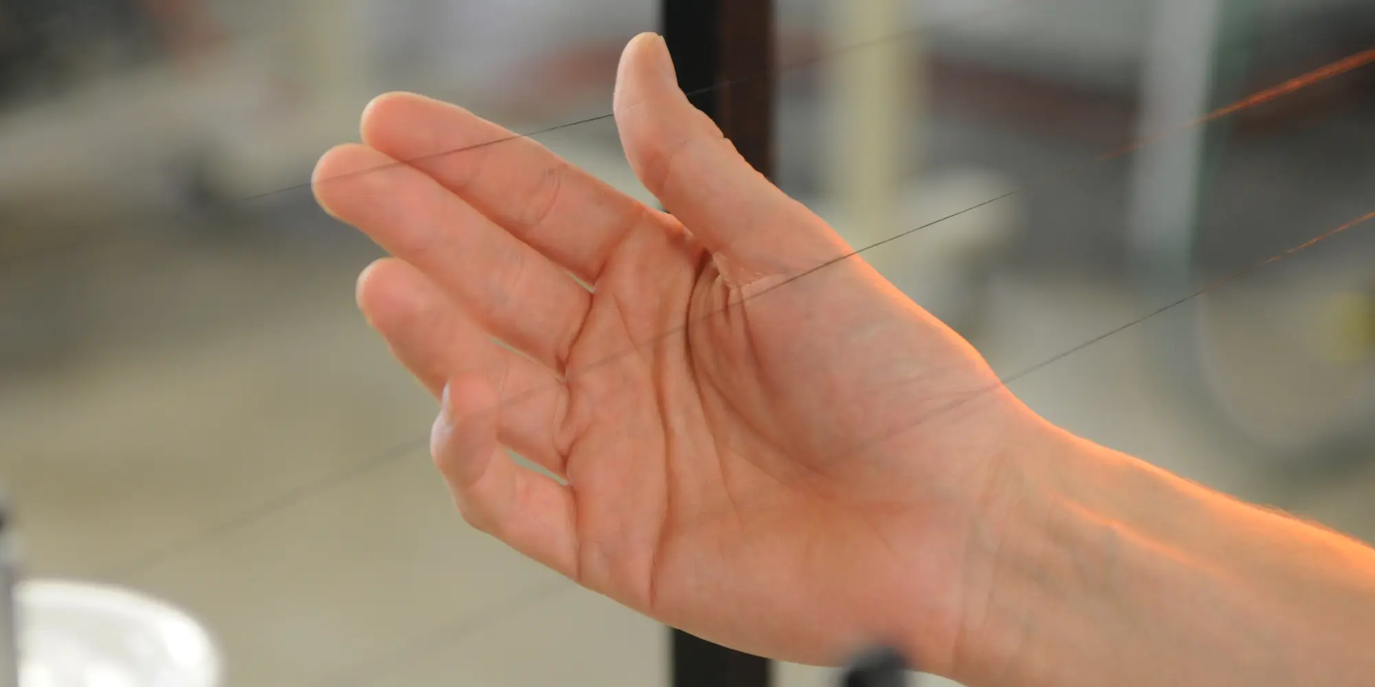 hand with yarn