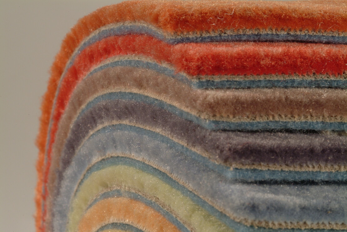 stack of carpets